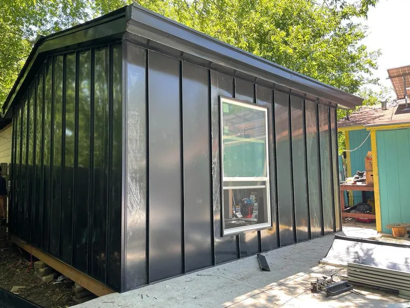 Black standing seam metal wall panels for Metal Roof Installation in Floris