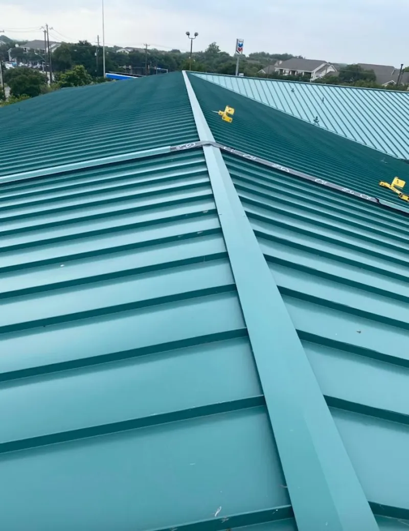 Green commercial metal roof ridge and valley for Metal Roof Repair in Floris